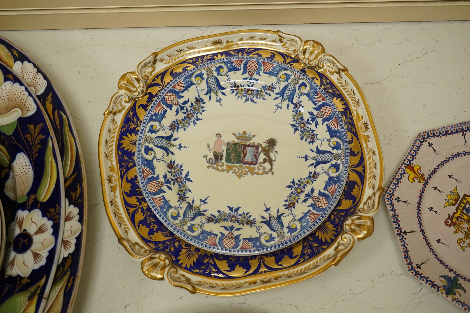 A Chamberlains Worcester armorial dessert dish, and a Spode armorial plate ‘The London’, c.1825 (produced for the Captain of the Ship 'The London’), both bearing the arms of the British East India Company, together with